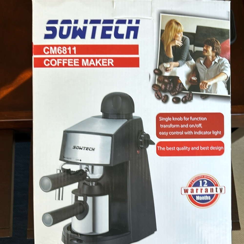 Expresso machine. Makes 4 cups. Frothing function